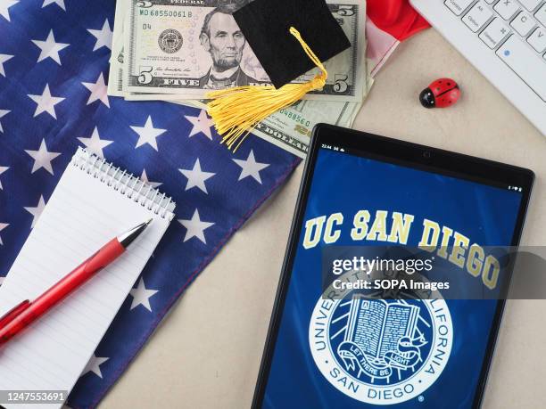 In this photo illustration, the University of California, San Diego logo seen displayed on a tablet.