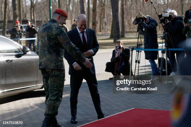 German Chancellor Olaf Scholz is welcomed by Lieutenant General Carsten Breuer during a visit of the territorial defence command of the Bundeswehr,...