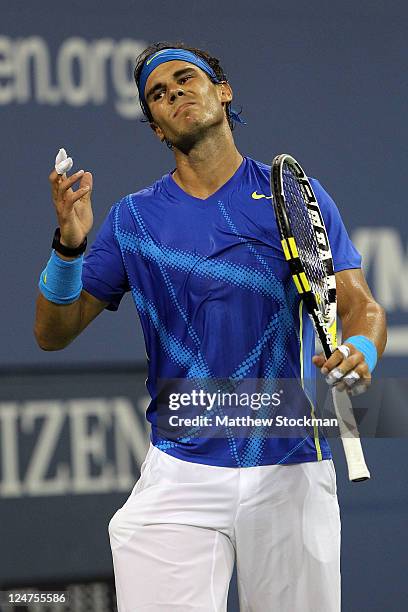 Rafael Nadal of Spain reacts against Novak Djokovic of Serbia during the Men's Final on Day Fifteen of the 2011 US Open at the USTA Billie Jean King...