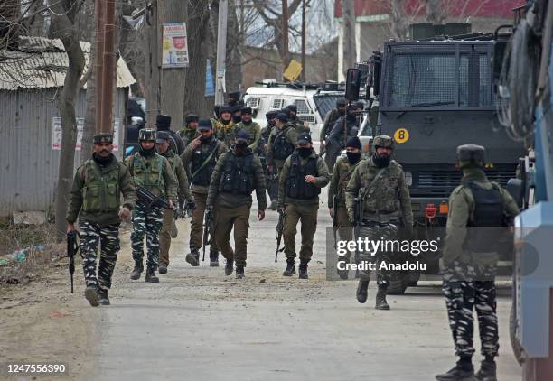 Indian soldiers patrol near the gunfight site in Padgampora Village of South Kashmir, India on February 28, 2023. Two local militants and an Indian...