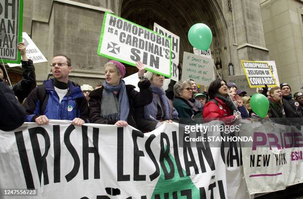 Members of the Irish Lesbian and Gay Organization protest 17 March 2001, on Fifth Avenue in New York during the St. Patrick's Day Parade. Each year...