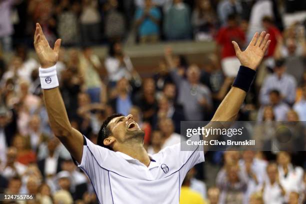 Novak Djokovic of Serbia reacts after he won match point against Rafael Nadal of Spain during the Men's Final on Day Fifteen of the 2011 US Open at...