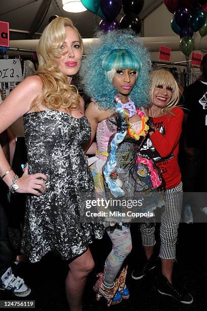 Lulu Johnson, Nicki Minaj and designer Betsey Johnson pose backstage at the Betsey Johnson Spring 2012 fashion show during Mercedes-Benz Fashion Week...