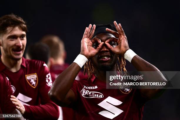 Torino's French foward Yann Karamoh celebrates after scoring the opening goal during the Italian Serie A football match between Juventus and Torino...