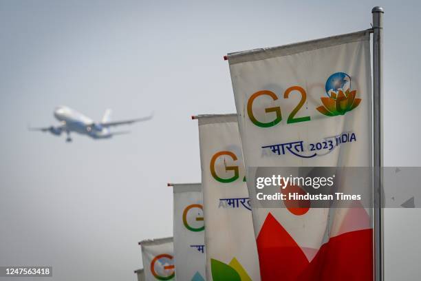 Flags installations are seen on the roadsides ahead of G20 Meetings at Indra Gandhi Road on February 28, 2023 in New Delhi, India.