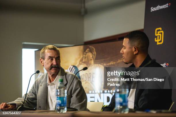 Padres Chairman Peter Seidler addresses Manny Machado of the San Diego Padres at his contract extension press conference at the Peoria Sports Complex...