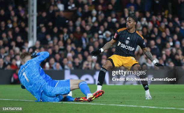 Fulham's Marek Rodak saves from Leeds United's Crysencio Summerville during The Emirates FA Cup Fifth Round match between Fulham and Leeds United at...