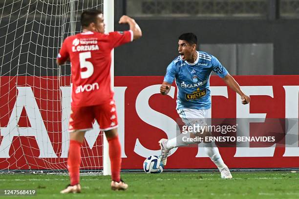 Sporting Cristal's forward Irven Avila celebrates scoring his second goal against Nacional during the second leg Copa Libertadores second stage...