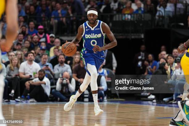 Justin Holiday of the Dallas Mavericks dribbles the ball during the game against the Indiana Pacers on February 28, 2023 at the American Airlines...