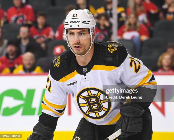 Garnet Hathaway of the Boston Bruins lines up for a face-off against the Calgary Flames during the first period of an NHL game at Scotiabank...