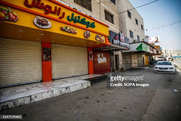 Closed shops after attacks by Jewish settlers on Palestinians in the town of Hawara, south of Nablus, in the occupied West Bank. Dozens of Israeli...
