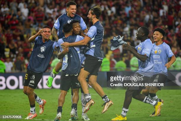 Independiente del Valle's defender Anthony Landazuri celebrates with teammates after scoring the last penalty to win the Conmebol Recopa Sudamericana...