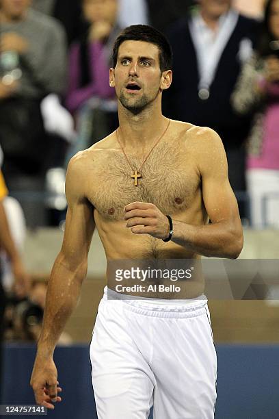 Novak Djokovic of Serbia looks on after he defeated Rafael Nadal of Spain during the Men's Final on Day Fifteen of the 2011 US Open at the USTA...