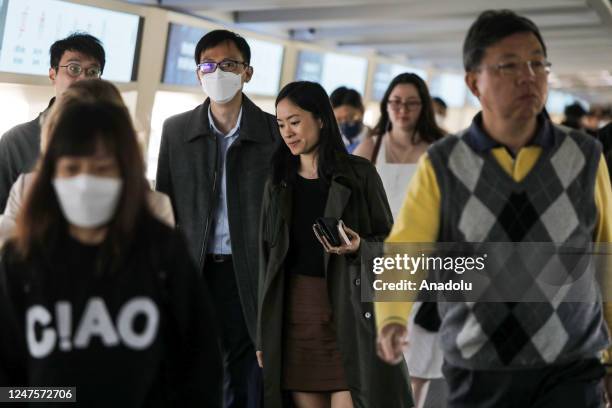 Citizens are seen on the street as Hong Kong lifts its mask mandate on March 1, 2023 in Hong Kong,China. Despite lifting mask mandate decision, some...