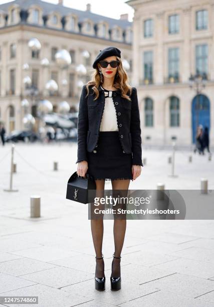Alexandra Lapp is seen wearing MAISON COMMON tweed jacket in black, MAISON COMMON bow top in creme, MAISON COMMON tweed shorts in black, SAINT...