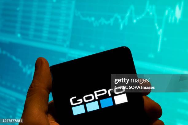 In this photo illustration, the American technology company and manufacturer known for its action cameras GoPro logo is seen displayed on a...