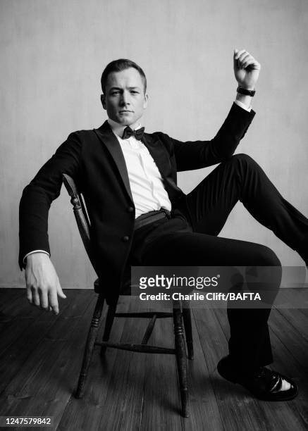 Actor Taron Egerton is photographed backstage at the 2023 EE BAFTA Film Awards, held at The Royal Festival Hall on February 19, 2023 in London,...