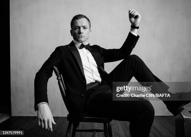 Actor Taron Egerton is photographed backstage at the 2023 EE BAFTA Film Awards, held at The Royal Festival Hall on February 19, 2023 in London,...