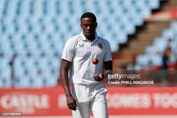 South Africa's Kagiso Rabada prepares to deliver a ball during the second day of the first Test cricket match between South Africa and West Indies at...