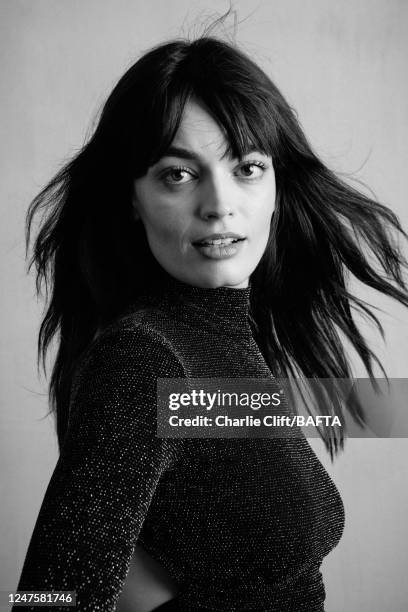 Actor Emma Mackey is photographed backstage at the 2023 EE BAFTA Film Awards, held at The Royal Festival Hall on February 19, 2023 in London, England.