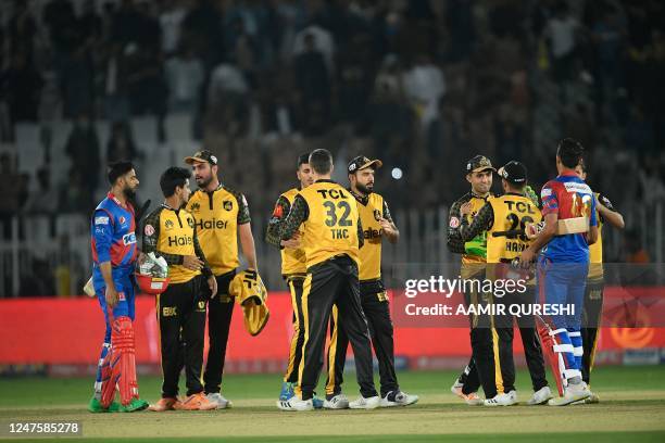 Peshawar Zalmi's players celebrate after winning the Pakistan Super League T20 cricket match between Karachi Kings and Peshawar Zalmi at the...