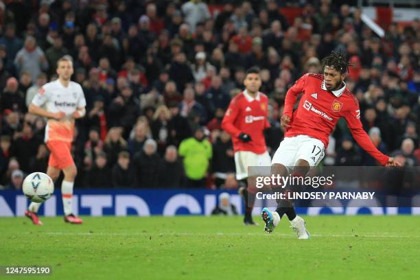 Manchester United's Brazilian midfielder Fred scores his team third goal during the English FA Cup fifth round football match between Manchester...