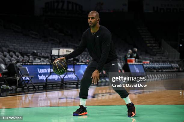 Chris Paul of the Phoenix Suns warms up before the game against the Charlotte Hornets on March 1, 2023 at Spectrum Center in Charlotte, North...