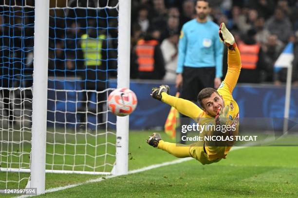 Annecy's French goalkeeper Thomas Callens dives for the ball during the penalty shoutout of the French Cup quarter final football match between...