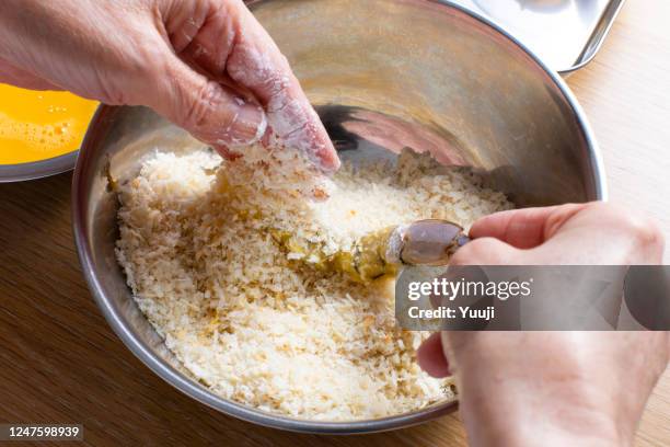 japanese home cooking, fried shrimp recipe and ingredients.put on breadcrumbs - breadcrumb stock pictures, royalty-free photos & images