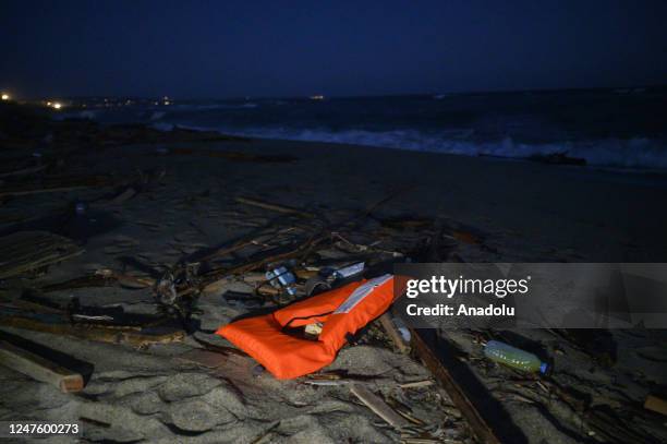 Lifejacket is seen on the beach in Crotone, Italy on March 01, 2023. Members of the Civil Protection of Cutro, Firefighters and Italian Coastguard...