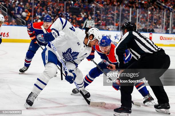 Edmonton Oilers Center Connor McDavid and Toronto Maple Leafs Center Auston Matthews battle for a face off in the first period of the Edmonton Oilers...