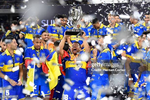 Frank Fabra of Boca Juniors lifts the trophy as the team becomes Supercopa Argentina 2022 champions after winning the final between Boca Juniors and...
