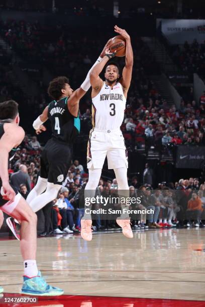 Matisse Thybulle of the Portland Trail Blazers attempts to block the shot of CJ McCollum of the New Orleans Pelicans during the game on March 1, 2023...