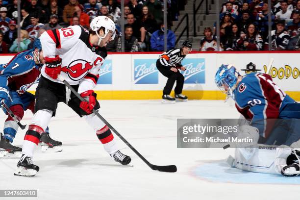 Nico Hischier of the New Jersey Devils shoots against goaltender Justus Annunen of the Colorado Avalanche at Ball Arena on March 1, 2022 in Denver,...