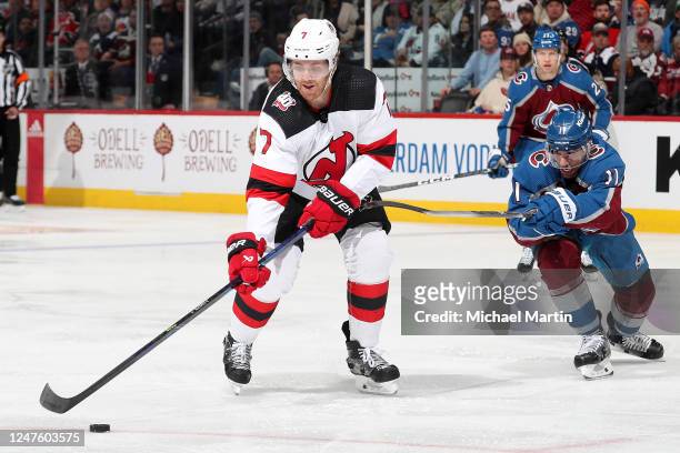 Dougie Hamilton of the New Jersey Devils skates against Andrew Cogliano of the Colorado Avalanche at Ball Arena on March 1, 2022 in Denver, Colorado.