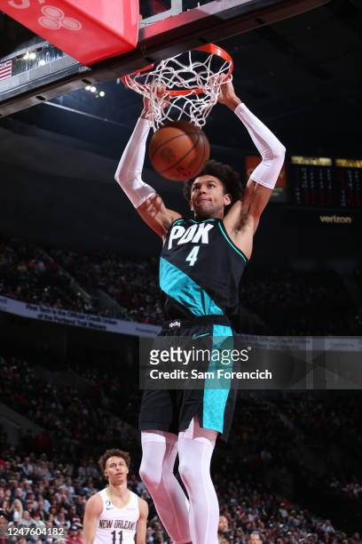 Matisse Thybulle of the Portland Trail Blazers dunks the ball during the game against the New Orleans Pelicans on March 1, 2023 at the Moda Center...