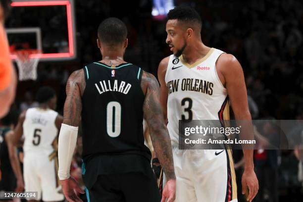 Damian Lillard of the Portland Trail Blazers and CJ McCollum of the New Orleans Pelicans talk following a game at Moda Center on March 01, 2023 in...