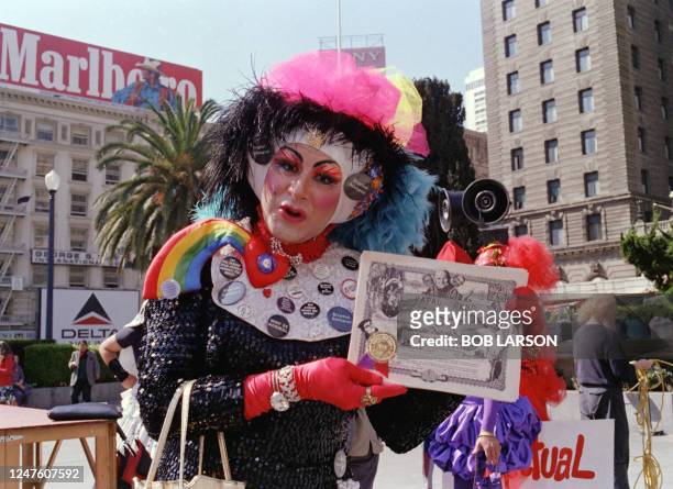 Sister Sadie Sadie, the Rabbi Lady, a gay rights activist and member of the "Sisters of Perpetual Indulgence", holds a "Papal Bond" during a protest...