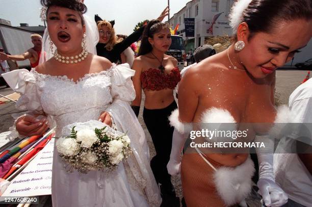 Group of transexual men get ready to participate in a parade during the 28th Gay and Lesbian Pride Festival 28 June in West Hollywood, CA. Organized...