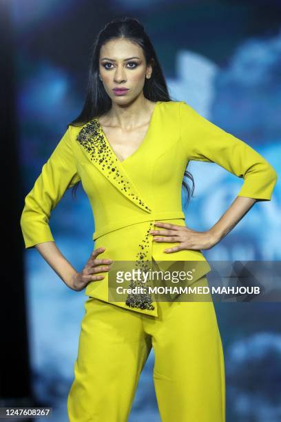 In this picture taken on March 1 a model presents a creation by Omani designer Heba AL-Kiyumi during a fashion show in Muscat.