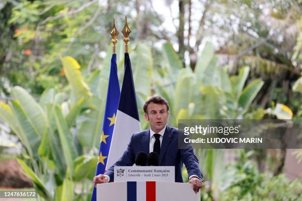 French President Emmanuel Macron delivers his speech to the French community at the residence of the French Ambassador in Libreveille on March 2,...