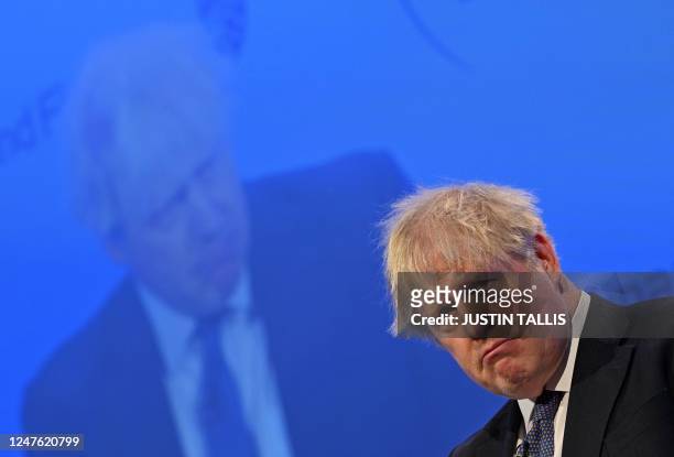 Britain's former Prime Minister Boris Johnson addresses delegates during the Global Soft Power Summit 2023 in central London on March 2, 2023. -...