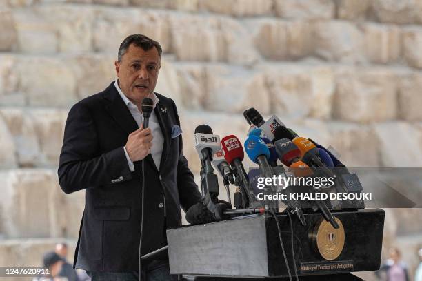 Egypt's Minister of Tourism and Antiquities Ahmed Issa gives a news conference in front of the Great Pyramid of Khufu at the Giza Pyramids necropolis...