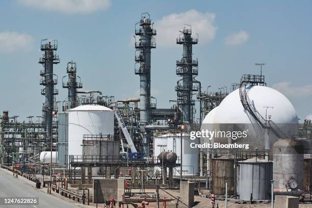 Distillation towers beyond spherical solvents storage tanks at the Sasol Ltd. Sasol One liquid fuels facility in Sasolburg, South Africa, on...