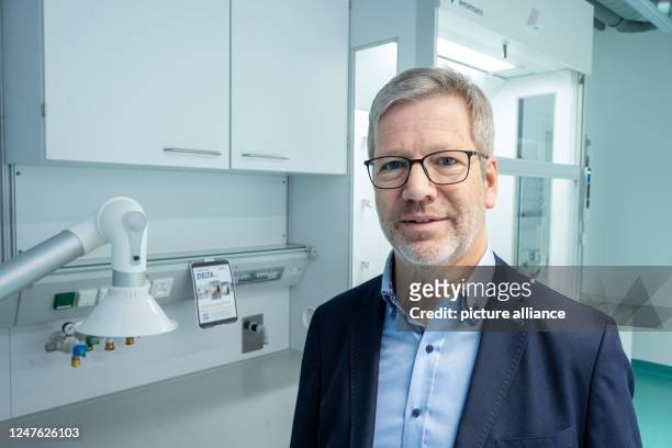 March 2023, Mecklenburg-Western Pomerania, Greifswald: Stefan Fassbinder , Lord Mayor of Greifswald, stands in a laboratory at the opening for the...