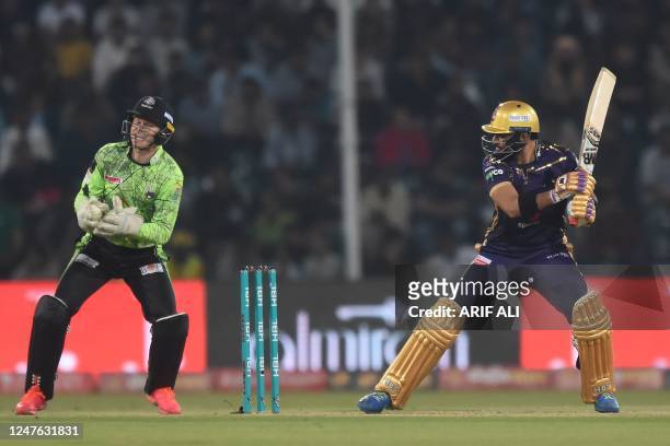 Lahore Qalandars' wicketkeeper Sam Billings takes a catch to dismiss Quetta Gladiators' Iftikhar Ahmed during the Pakistan Super League T20 cricket...