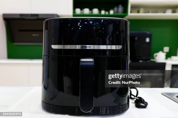 The Mi Smart Air Fryer Pro, the newest air fryer of Xiaomi, being exhibited on the smart home display of the Chinese brand during the Mobile World...