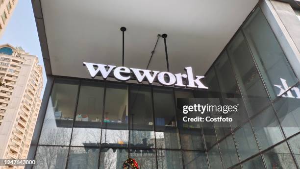 The office building of WeWork, a US co-working space provider and maker leader, is seen in Shanghai, China, March 2, 2023. While "co-working" was a...