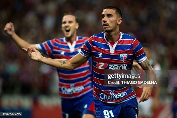 Fortaleza's forward Thiago Galhardo celebrates after scoring a goal during the second leg Copa Libertadores second stage football match between...