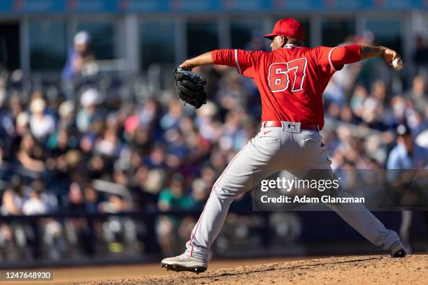 César Valdez of the Los Angeles Angels pitches during the game between the Los Angeles Angels and the Seattle Mariners at T-Mobile Park on Saturday,...